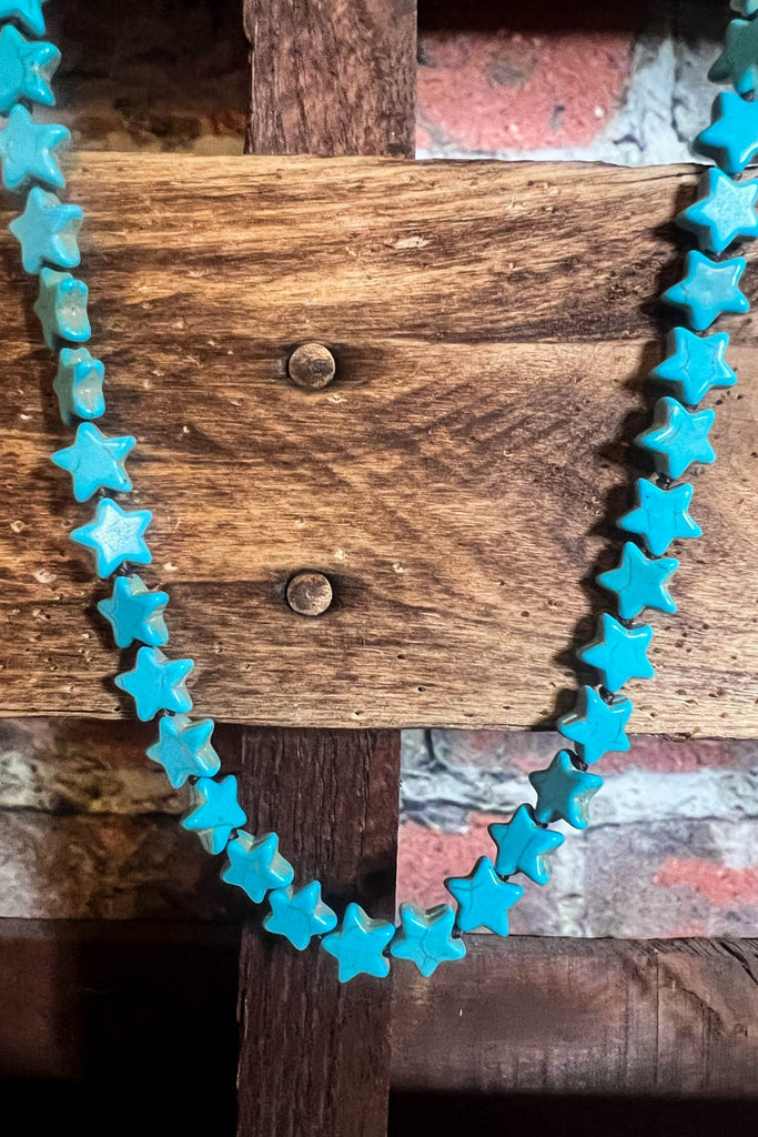 SURROUNDED BY HOPE STARS LONG NECKLACE BLUE TURQUOISE